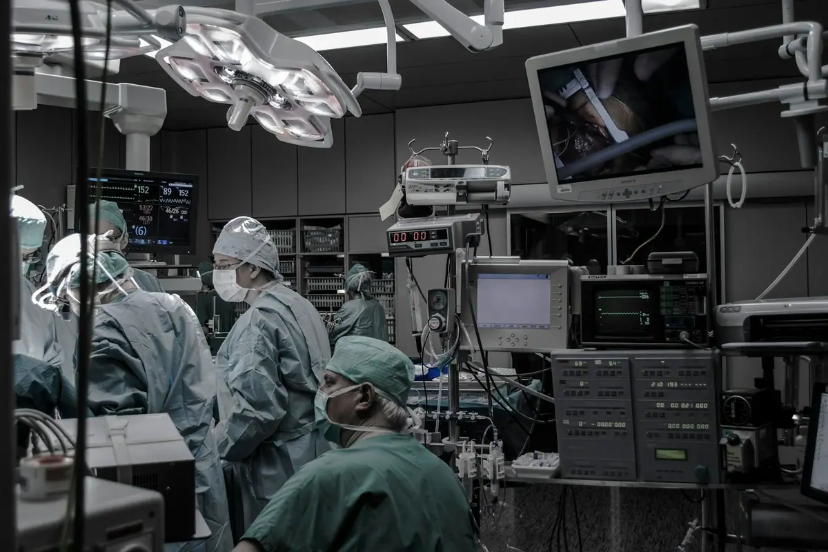 Medical staff and monitors in an operating room